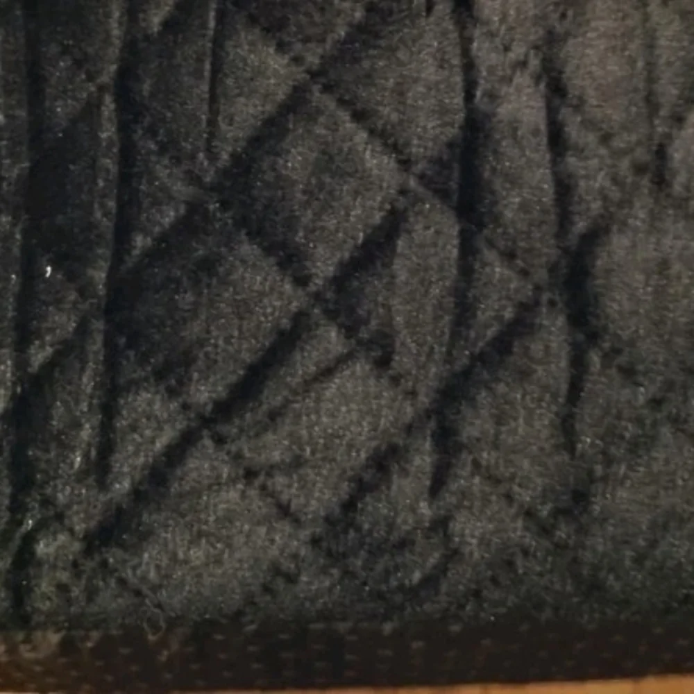 Gray and Black Quilted Car Seat with Orange Trim
